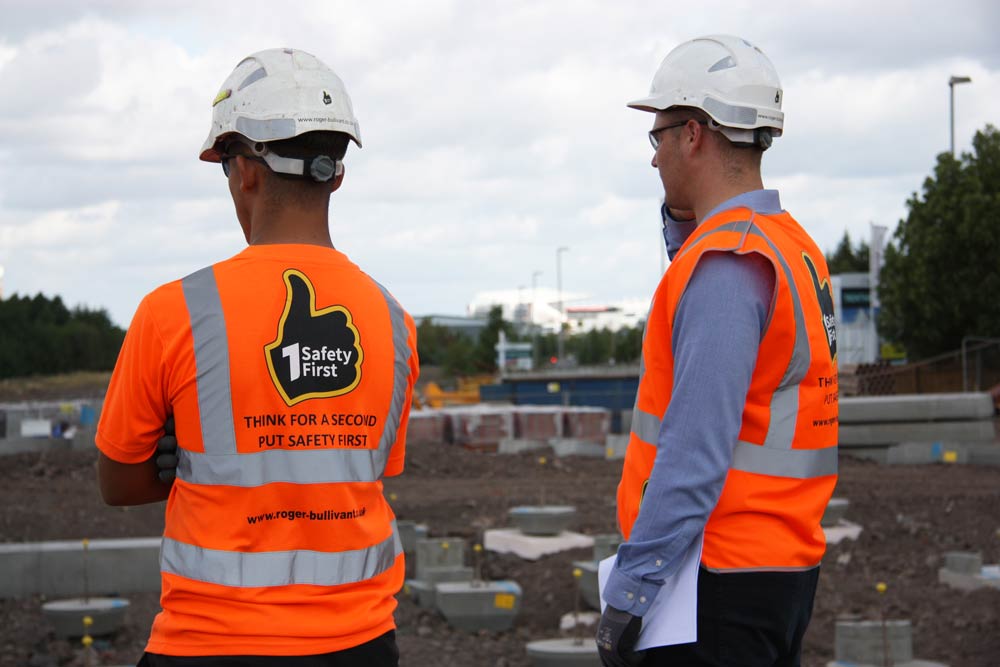 Two Roger Bullivant workers wearing safety gear